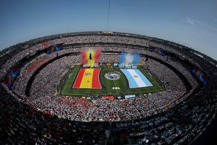 EAST RUTHERFORD, NEW JERSEY - JULY 19: Players and match officials line up before the FIFA World Cup 2026 Final match between Spain and Argentina at New York New Jersey Stadium on July 19, 2026 in East Rutherford, New Jersey. Al Bello/Getty Images/AFP (Photo by AL BELLO/GETTY IMAGES NORTH AMERICA/Getty Images via AFP)