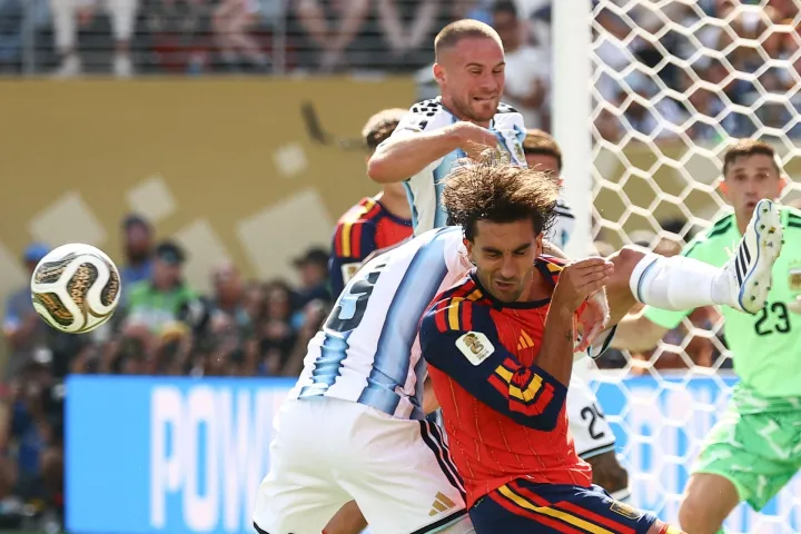(From L) Argentina's midfielder #05 Leandro Paredes, Argentina's midfielder #20 Alexis Mac Allister, Spain's forward #07 Ferran Torres fight for the ball next to Argentina's goalkeeper #23 Emiliano Martinez during the 2026 World Cup football tournament final match between Spain and Argentina at the New York/New Jersey Stadium in East Rutherford on July 19, 2026. (Photo by CHARLY TRIBALLEAU/AFP)