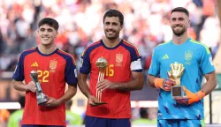 EAST RUTHERFORD, NEW JERSEY - JULY 19: Pau Cubarsi #22, Rodri #16 and Unai Simon #23 of Spain pose with their awards after the FIFA World Cup 2026 Final match between Spain and Argentina at New York New Jersey Stadium on July 19, 2026 in East Rutherford, New Jersey. Carl Recine/Getty Images/AFP (Photo by Carl Recine/GETTY IMAGES NORTH AMERICA/Getty Images via AFP)