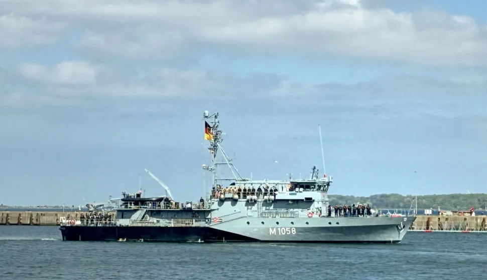 (FILES) The German navy's minehunter boat "Fulda" leaves the harbour of Kiel, northern Germany, on May 4, 2026, to set sail for the Mediterranean as part of a pre-deployment operation in preparation for a possible mission in the Strait of Hormuz. The German navy will move two vessels from the Red Sea region to the eastern Mediterannean "in the coming days", the defence ministry said in a statement on July 23, 2026. The "Fulda" minesweeper and the "Mosel" supply ship were currently in Djibouti, a ministry spokesman confirmed to AFP. They had been sent last month in preparation for a possible mission in the Strait of Hormuz after the end of the US-Iran war. However the ministry statement cited the "the volatile political situation... and the absence of any foreseeable near-term start of operations" in the Strait of Hormuz. (Photo by Sandra BECKEFELDT/AFP)