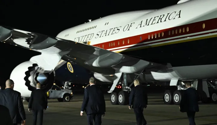 US President Donald Trump walks towards Air Force One after disembarking from the older VC-25A Air Force One at Royal Air Force (RAF) Mildenhall in Mildenhall, eastern England, on July 8, 2026, before continuing his journey to the United States. Trump returns from NATO Summit in Turkey (Photo by SAUL LOEB/AFP)