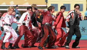 Members of the South Korean boy band BTS perform during the 2026 World Cup football tournament final match between Spain and Argentina at the New York/New Jersey Stadium in East Rutherford on July 19, 2026. (Photo by JUAN MABROMATA/AFP)