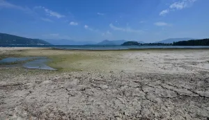 This photograph shows sandbanks exposed by the receding waters of Lake Maggiore, in Ispa, northern Italy, on August 6, 2026. (Photo by Stefano RELLANDINI/AFP)