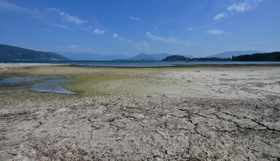 This photograph shows sandbanks exposed by the receding waters of Lake Maggiore, in Ispa, northern Italy, on August 6, 2026. (Photo by Stefano RELLANDINI/AFP)