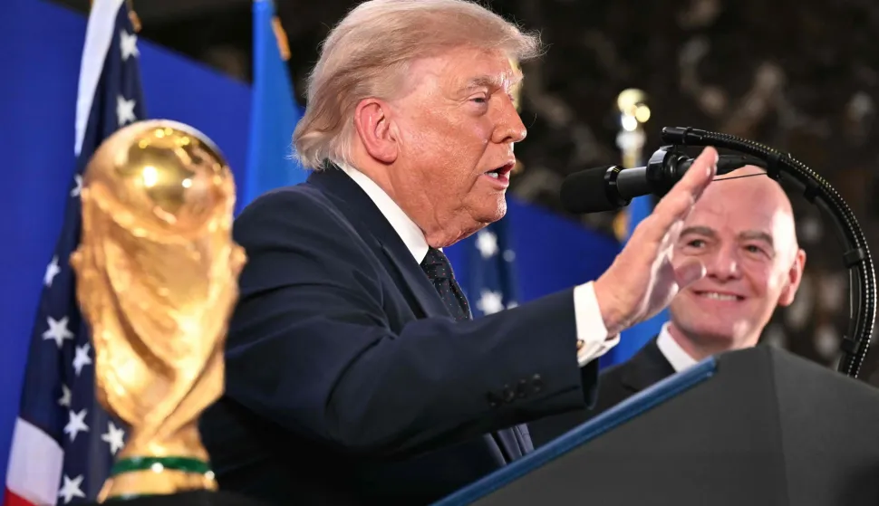 FIFA President Gianni Infantino (R) smiles as US President Donald Trump speaks during a FIFA reception at Trump Tower in New York on July 17, 2026. President Trump will attend the 2026 World Cup Final between Spain and Argentina. (Photo by Mandel NGAN/AFP)