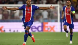 Paris Saint-Germain's French midfielder #14 Desire Doue celebrates scoring the 2-1 goal with his teammates during the UEFA Supercup football match between Champions League winners Paris Saint Germain (PSG) and Europa League winners Aston Villa in Salzburg, Austria on August 12, 2026. (Photo by FRANCK FIFE/AFP)