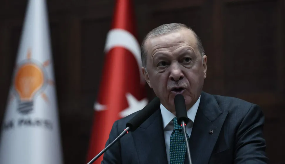Turkish President and the leader of the Justice and Development Party (AKP) Recep Tayyip Erdogan gives a speech during his party's parliamentary group meeting at the Turkish Grand National Assembly in Ankara on February 11, 2025. (Photo by Adem ALTAN/AFP)