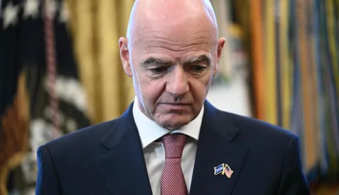 (FILES) FIFA president Gianni Infantino looks on during a meeting with the White House Task Force on the FIFA World Cup 2026 in the Oval Office of the White House in Washington, DC on November 17, 2025. FIFA president Gianni Infantino has lost the "confidence" of the UEFA, European football's governing body, it said in a statement on August 1, 2026, after his plan to allow private investment in the World Cup was withdrawn following a global backlash. (Photo by Brendan SMIALOWSKI/AFP)