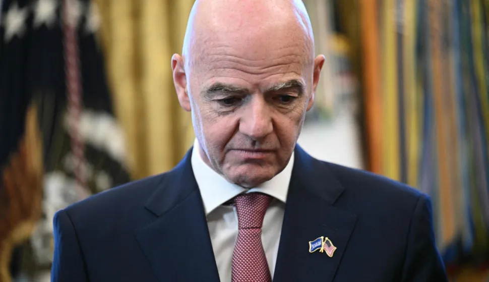 (FILES) FIFA president Gianni Infantino looks on during a meeting with the White House Task Force on the FIFA World Cup 2026 in the Oval Office of the White House in Washington, DC on November 17, 2025. FIFA president Gianni Infantino has lost the "confidence" of the UEFA, European football's governing body, it said in a statement on August 1, 2026, after his plan to allow private investment in the World Cup was withdrawn following a global backlash. (Photo by Brendan SMIALOWSKI/AFP)