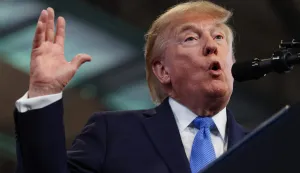 GARDEN CITY, NEW YORK - AUGUST 14: U.S. President Donald Trump delivers remarks at the David S. Mack Center for Training and Intelligence on August 14, 2026 in Garden City, New York. President Trump visited the police academy to highlight the FBI's 2025 Crime Statistics Report and rally support for local Republican candidates ahead of the upcoming midterm elections. Samuel Corum/Getty Images/AFP (Photo by Samuel Corum/GETTY IMAGES NORTH AMERICA/Getty Images via AFP)