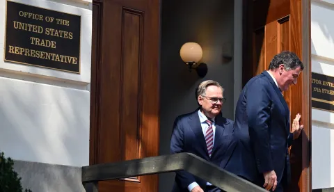 Dominic LeBlanc (R), Canada's minister in charge of US-Canada trade, exits the office of US Trade Representative Jamieson Greer after a meeting in Washington, DC, on August 20, 2026. US and Canadian negotiators were set to resume trade talks in Washington on Thursday, after Prime Minister Mark Carney briefed Canada's regional leaders on the outlines of a pact to stabilize bilateral trade. A new spate of 50-percent US tariffs were set to take effect on Canadian imports on August 19, but US President Donald Trump said the day before that he was delaying enactment for 72 hours as a deal looked close. (Photo by Mandel NGAN/AFP)