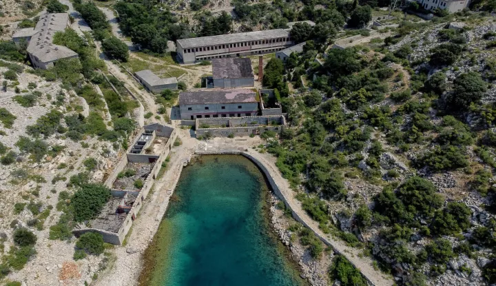 11.07.2024., Goli otok - Zracna fotografija Golog otoka na kojem se gotovo 40 godina nalazio logor i zatvor. Logor je na otoku otvoren 1949. godine, a ukinut je 1988. te se procjenjuje da je kroz logor pro&scaron;lo između 17 i 32 tisuće zatvorenika. Photo: Sime Zelic/PIXSELL