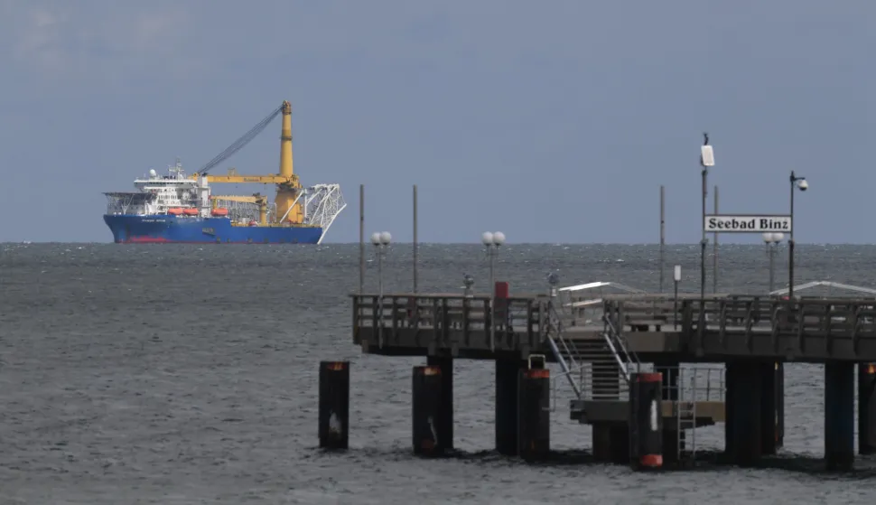 12 May 2020, Sassnitz: The Russian pipe-laying ship "Akademik Tscherski" lies in front of the chalk cliffs of the island of Ruegen. Barely five months after the construction stop on the Nord Stream 2 Baltic Sea pipeline, the Russian pipe-laying ship has reached the Baltic Sea off the island of Ruegen. Photo: Stefan Sauer/dpa-Zentralbild/dpa