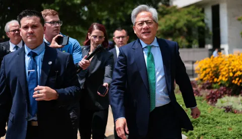 WASHINGTON, DC - JULY 28: Nvidia CEO Jensen Huang talks to members of the press as he leaves the Hart Senate Office Building on July 28, 2026 in Washington, DC. In a statement from Nvidia, Huang was meeting with lawmakers on the Hill to discuss American leadership on artificial intelligence. Finn Gomez/Getty Images/AFP (Photo by Finn Gomez/GETTY IMAGES NORTH AMERICA/Getty Images via AFP)