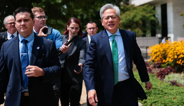 WASHINGTON, DC - JULY 28: Nvidia CEO Jensen Huang talks to members of the press as he leaves the Hart Senate Office Building on July 28, 2026 in Washington, DC. In a statement from Nvidia, Huang was meeting with lawmakers on the Hill to discuss American leadership on artificial intelligence. Finn Gomez/Getty Images/AFP (Photo by Finn Gomez/GETTY IMAGES NORTH AMERICA/Getty Images via AFP)