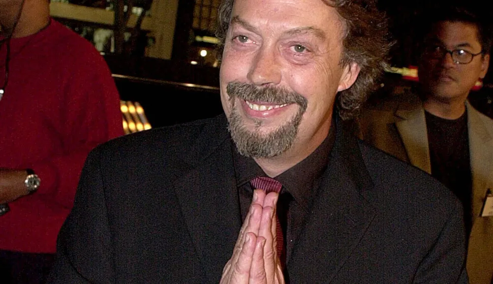 (FILES) British actor Tim Curry arrives at the premiere of his new film "Charlie's Angel's", in Hollywood, 22 October 2000. AFP PHOTO/Lucy NICHOLSON. Tim Curry, the English actor best known for his star turn as Dr Frank-N-Furter in the cult classic musical film "The Rocky Horror Picture Show," has died at the age of 80, celebrity website TMZ reported Wednesday. (Photo by LUCY NICHOLSON/AFP)