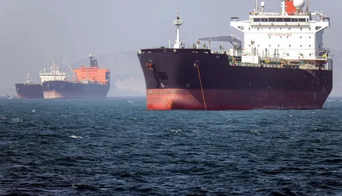 In this picture obtained from Iran's ISNA news agency on May 2, 2026, the Gambia-flagged tanker vessel Bili is pictured anchored in the Strait of Hormuz off Bandar Abbas in southern Iran. Iran's Revolutionary Guards on May 4 denied that any commercial ships had crossed the Strait of Hormuz, after the US military earlier said two US-flagged merchant vessels had transited through the vital waterway. (Photo by Amirhossein KHORGOOEI/ISNA/AFP)/