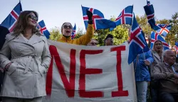Supporters of the 'No' campaign display a banner during a rally against reopening Iceland's European Union accession negotiations in Reykjavik, Iceland, on August 27, 2026, two days ahead of a national referendum. Icelanders will vote on August 29 on whether the country should resume EU accession negotiations, which were suspended in 2013. The referendum does not decide EU membership, with any eventual accession agreement requiring a second public vote. (Photo by Jonathan NACKSTRAND/AFP)