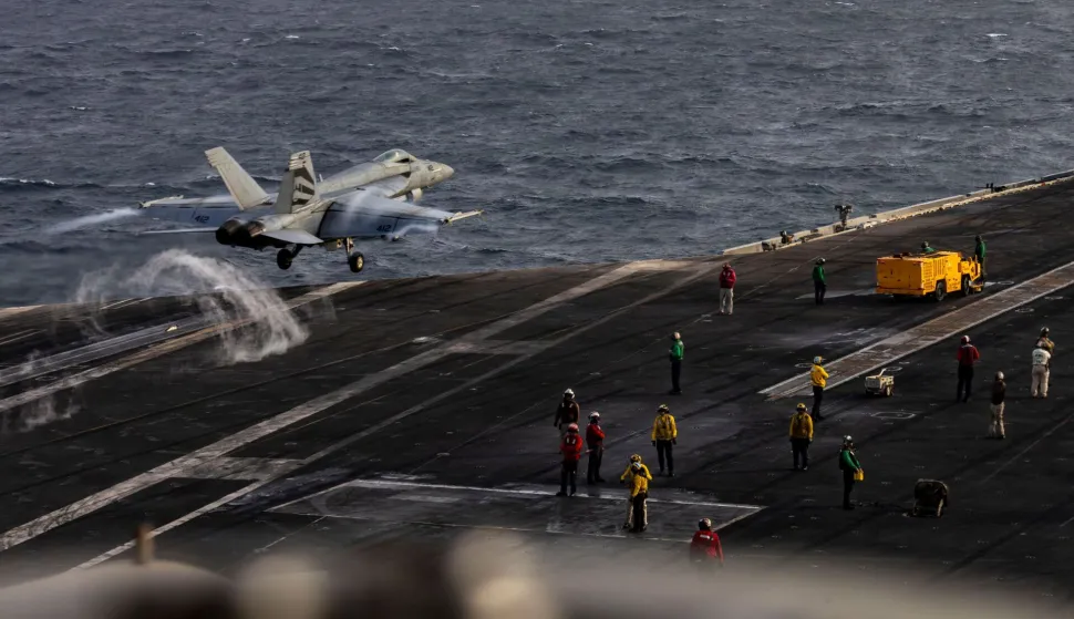 (FILES) This US Navy handout photograph released on August 4, 2026, by US Central Command Public Affairs shows an F/A-18E Super Hornet launching from the flight deck of Nimitz-class aircraft carrier USS Abraham Lincoln on July 31, 2026. Some sailors have reportedly tried throwing themselves into the sea, basic supplies can run short and sanitation is going awry: life on America's giant Abraham Lincoln aircraft carrier is increasingly difficult as the Iran war drags on. The ship -- now in its ninth month of deployment -- is expected to be replaced in the Middle East by another carrier, the George Washington, in a move sure to be welcomed by the Lincoln's crew and their loved ones. (Photo by various sources/AFP)/RESTRICTED TO EDITORIAL USE - MANDATORY CREDIT "AFP PHOTO/US NAVY/NAVCENT PUBLIC AFFAIRS" - HANDOUT - NO MARKETING NO ADVERTISING CAMPAIGNS - DISTRIBUTED AS A SERVICE TO CLIENTSAttention editors: AFP covers the war in the Middle East through its extensive regional network, including bureaus in Tehran, Jerusalem, and several neighboring countries. Since the start of the conflict, journalists have been working under increasingly restrictive conditions. Authorities in several countries have limited reporters' movements, photo and live video coverage from sensitive locations. Some governments and armed groups have banned images of missile or drone strikes and other security-related sites./TO GO WITH AFP FOCUS STORY BY W.G. DUNLOP- AUGUST 14, 2026.