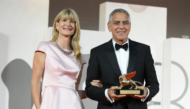 American actress Laura Dern and American actor George Clooney holding the Golden Lion for Lifetime Achievementat the 83 Venice International Film Festival 2026, Ink Screening And Opening Ceremony Red Carpet in Venice (Italy), September 2nd, 2026 (Photo by Marilla Sicilia/Mondadori Portfolio/Sipa USA) Photo: Mondadori Portfolio/SIPA USA