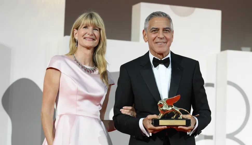 American actress Laura Dern and American actor George Clooney holding the Golden Lion for Lifetime Achievementat the 83 Venice International Film Festival 2026, Ink Screening And Opening Ceremony Red Carpet in Venice (Italy), September 2nd, 2026 (Photo by Marilla Sicilia/Mondadori Portfolio/Sipa USA) Photo: Mondadori Portfolio/SIPA USA