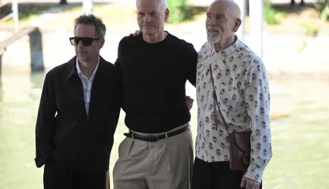 US actor Sam Rockwell, director Martin McDonagh and US actor John Malkovich arrive for the photocall and the presser of "Wild Horse Nine" at the 83rd International Venice Film Festival, at Venice Lido on September 3, 2026. (Photo by Tiziana FABI/AFP)