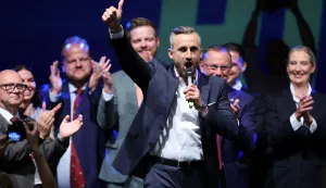 Ulrich Siegmund, far-right Alternative for Germany (AfD)'s main candidate in the Saxony-Anhalt state election, gestures as he addresses supporters at the AfD's election party following Saxony-Anhalt's state elections in Magdeburg, eastern Germany on September 6, 2026. Germany's far-right AfD won a landslide victory in a key regional election on September 6 in the ex-communist east, according to exit polls, but it remain unclear whether it can win an absolute majority to govern. (Photo by Ronny HARTMANN/AFP)