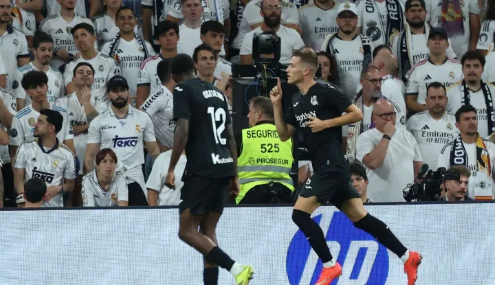 Real Sociedad's Croatian midfielder #24 Luka Susic (R) celebrates scoring his team's first goal during the Spanish league football match between Real Madrid CF and Real Sociedad at Santiago Bernabeu Stadium in Madrid on August 26, 2026. (Photo by Thomas COEX/AFP)