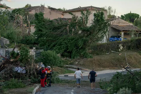 This photograph taken on August 24, 2026, shows damaged houses and toppled trees after a tornado struck Pomas, southwestern France. A tornado struck the Aude department on August 24 as part of southwestern France remained under an orange storm alert, with several rooftops torn off in the village of Pomas, an AFP photographer at the scene reported. (Photo by Idriss Bigou-Gilles/AFP)