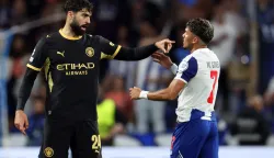 Manchester City's Croatian defender #24 Josko Gvardiol points at FC Porto's Brazilian forward #07 William Gomes during the UEFA Champions League first round day 1 football match between FC Porto and Manchester City at Dragao stadium in Porto on September 8, 2026. (Photo by PATRICIA DE MELO MOREIRA/AFP)