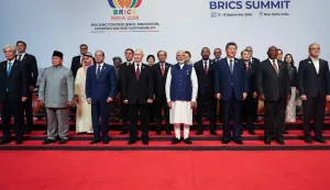 In this pool photograph distributed by the Russian state agency Sputnik, leaders of participating countries gather for a family photograph during the 18th BRICS Summit in New Delhi on September 13, 2026. (Photo by Alexander KAZAKOV/POOL/AFP)/***Editor's note: this image is distributed by the Russian state owned agency Sputnik***