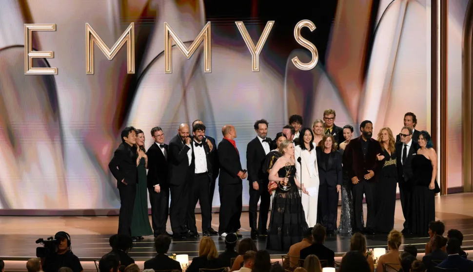US screenwriter Katie Dippold and members of the cast accepts the award Outstanding Comedy Series for "Widow's Bay" onstage during the 78th Primetime Emmy Awards at the Peacock Theatre at LA Live in Los Angeles on September 14, 2026. (Photo by Patrick T. Fallon/AFP)/RESTRICTED TO EDITORIAL USE
