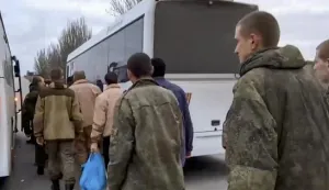 epa10326014 A handout still image taken from handout video provided by the Russian Defence ministry press-service shows a group of Russian servicemen former prisoners of war (POW) board to the buses after their exchange at the unknown location in Russia, 24 November 2022. The Russian Defense Ministry announced that 50 Russian servicemen, prisoners of war, returned to Russia after prisoners swap with Ukraine. To the Ukraine returned 50 Ukrainian servicemen. EPA/RUSSIAN DEFENCE MINISTRY PRESS SERVICE/HANDOUT HANDOUT EDITORIAL USE ONLY/NO SALES