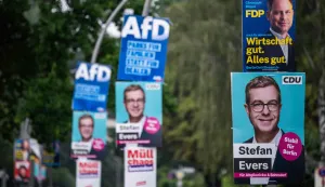 Placards feature a portrait of the Christian Democratic Party's (CDU) main candidate in Berlin's regional elections Stefan Evers in the capital's Waltersdorf area on August 19, 2026. Berlin goes to the polls on September 20, 2026. (Photo by John MACDOUGALL/AFP)
