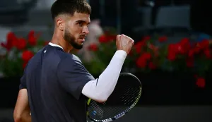 Croatia's Dino Prizmic reacts as he plays against Serbia's Novak Djokovic during their men's singles match of the WTA Rome Open tennis tournament at the Foro Italico in Rome on May 8, 2026. (Photo by Filippo MONTEFORTE/AFP)