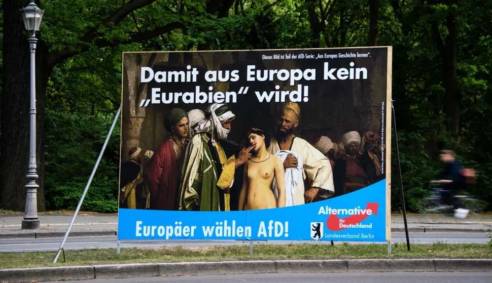 epa07532645 An election campaign poster for the European Parliament elections of the Berlin chapter of the right-wing Alternative fuer Deutschland (AfD) party, showing the artwork 'The Slave Market' (1866) of French painter Jean-Leon Gerome, subscribed with the slogans 'Europeans vote AfD!' and 'for Europe will not become 'Eurabia'!' stands in a central part in Berlin, Germany, 27 April 2019. The Massachusetts-based Clark Art Institute, who owns the painting, condemned the use on Twitter and pointed out, that they didn't supply it to the AfD. News reports state, the institute asked the AfD to stop using the painting for their aims. EPA/CLEMENS BILAN
