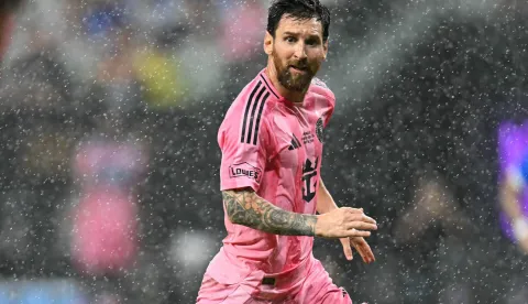 TOPSHOT - Inter Miami's Argentine forward #10 Lionel Messi runs under a light rain during the Campeones Cup final football match between Inter Miami CF and Mexico's Cruz Azul at Nu Stadium in Miami, Florida, on September 16, 2026. (Photo by CHANDAN KHANNA/AFP)