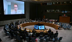 Anthropic CEO Dario Amodei (L) and Hugging Face CEO Clement Delangue appears by video during a UN Security Council meeting on artificial intelligence during the 81st United Nations General Assembly at UN headquarters in New York on September 23, 2026. (Photo by ANGELA WEISS/AFP)