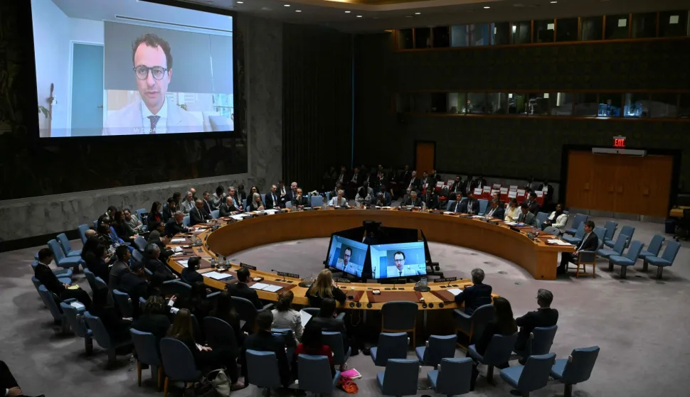 Anthropic CEO Dario Amodei (L) and Hugging Face CEO Clement Delangue appears by video during a UN Security Council meeting on artificial intelligence during the 81st United Nations General Assembly at UN headquarters in New York on September 23, 2026. (Photo by ANGELA WEISS/AFP)
