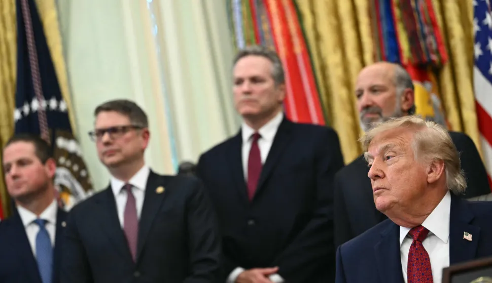 US President Donald Trump looks on while making an announcement in the Oval Office of the White House in Washington, DC, on September 30, 2026. (Photo by Kent NISHIMURA/AFP)