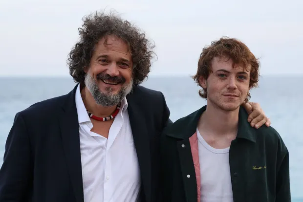 French actors Mathias Mlekuz (L) and Manolo Mlekuz (R) pose during a photocall for the film "Mon fils president" as part of the 8th edition of the Cineroman film festival in Nice, south-eastern France, on October 2, 2026. (Photo by Valery HACHE/AFP)