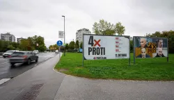 Billboards reading "4x against" and "4x against the government", are pictured ahead of the October 11 referendum on several legislative initiatives, including a law passed in May to extend the powers of parliamentary inquiry commissions, in Ljubljana on October 9, 2026. (Photo by Jure Makovec/AFP)