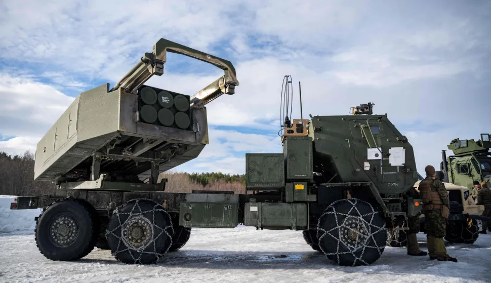 (FILES) A US M142 High Mobility Artillery Rocket System (HIMARS) is on display during a demonstration near Setermoen on March 12, 2026, as NATO conducts its Cold Response military exercise. Sweden's government said on September 7, 2026 that the country would spend seven billion kronor (USD 730 million) to buy US-made HIMARS rocket artillery for it military. The government said in a statement that the acquisition would "enable the Swedish Armed Forces to operate over larger areas, and with greater long-range capacity than with current systems." Defence Minister Pal Jonson told reporters that the deal covered about 10 trucks equipped with launchers and a large quantity of ammunition, news agency TT reported. (Photo by John MACDOUGALL/AFP)