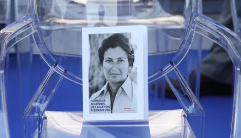 epa06854712 A photo of former French politician and Holocaust survivor Simone Veil lies on an empty chair during her burial ceremony at the Pantheon in Paris, France 01 July 2018. Former Health Minister, Simone Veil, who passed away on June 30, 2017 became president of the European Parliament and one of France's most revered politicians by advocating the 1975 law legalising abortion in France. She will be only the fifth woman buried at the monument to France's dignitaries, where she will be laid to rest at the Pantheon with her husband Antoine, a high-ranking civil servant who died in 2013. EPA/LUDOVIC MARIN/POOL MAXPPP OUT