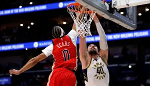 NEW ORLEANS, LOUISIANA - OCTOBER 21: Ivica Zubac #40 of the Indiana Pacers dunks over Jeremiah Fears #0 of the New Orleans Pelicans during the third quarter at Smoothie King Center on October 21, 2026 in New Orleans, Louisiana. NOTE TO USER: User expressly acknowledges and agrees that, by downloading and or using this photograph, User is consenting to the terms and conditions of the Getty Images License Agreement. Sean Gardner/Getty Images/AFP (Photo by Sean Gardner/GETTY IMAGES NORTH AMERICA/Getty Images via AFP)