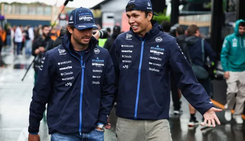 Williams' Spanish driver Carlos Sainz (L) and Williams' Thai driver Alexander Albon walk in the paddock ahead of the Formula One Dutch Grand Prix at The Circuit Zandvoort, western Netherlands, on August 21, 2026. (Photo by SIMON WOHLFAHRT/AFP)
