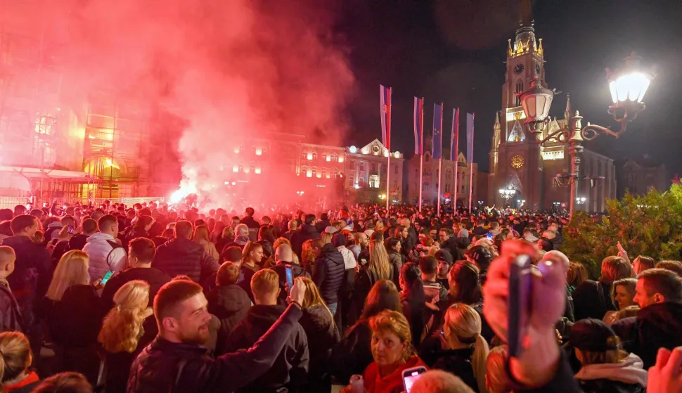 Citizens of Northern-Serbian city of Novi Sad celebrate in the streets after students movement declared victory of their candidates list at snap Parliamentary elections, on October 25, 2026. Voters cast ballots in record numbers on October 25, 2026, with the country recording its highest parliamentary election turnout in more than three decades. Celebrations erupted on the streets of the capital; passing cars honked their horns as crowds began to party at the news that Serbia's ruling party had lost parliamentary snap elections. (Photo by NENAD MIHAJLOVIC/AFP)