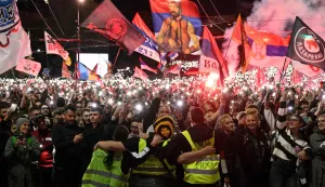 Supporters of Serbia's student-led movement attend the final campaign rally of the student-backed election list in central Belgrade on October 22, 2026, ahead of the country's snap parliamentary elections on October 25. The vote follows nearly two years of student-led protests sparked by the November 2024 collapse of a railway station canopy in Novi Sad that killed 16 people, with demands for early elections becoming a central goal of the movement. The student-backed list is challenging the ruling Serbian Progressive Party (SNS), led in the campaign by former president Aleksandar Vucic, who resigned in September to run for prime minister. (Photo by Andrej ISAKOVIC/AFP)