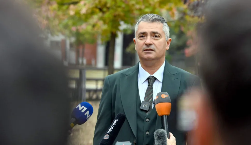 Ilija Srdanovic (C), main candidate of the opposition speaks to the press as he arrives to vote for the snap Parliamentary elections at polling station in Novi Sad, Serbia, on October 25, 2026. Polls opened in Serbia on October 25, 2026, in what is set to be its most fiercely contested parliamentary election in more than 14 years, as a student-led movement seeks to oust the party of veteran leader Vucic. The snap vote is the culmination of nearly two years of student-led protests sparked by the 2024 collapse of a canopy at Novi Sad railway station that killed 16 people, a tragedy widely blamed on corruption. (Photo by NENAD MIHAJLOVIC/AFP)