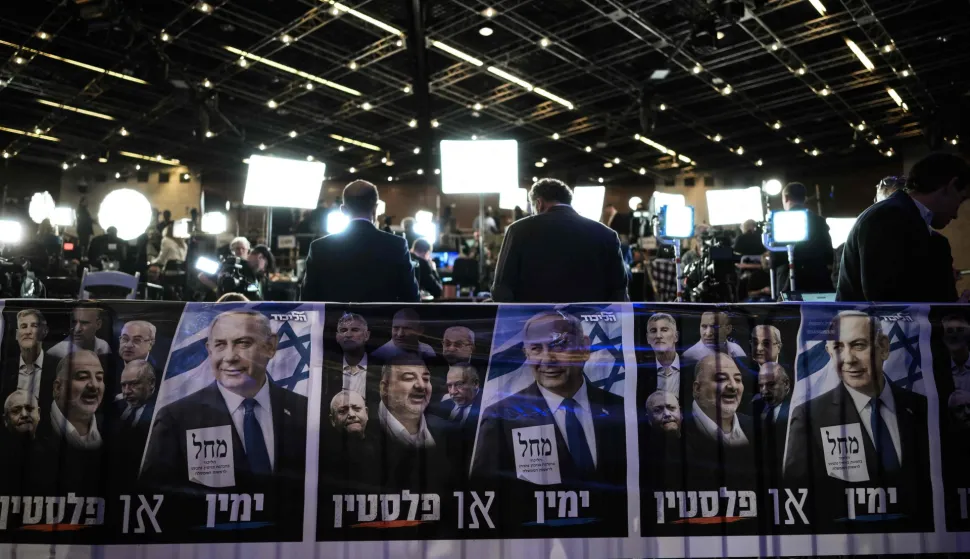 Journalists are waiting at the Likud party election night rally in Jerusalem on October 27, 2026, on the day of Israel's legislative election. Polls closed at 10 pm (2000 GMT) on October 27 in Israel's pivotal general election, which saw high voter turnout and veteran Prime Minister Benjamin Netanyahu fighting for his political life. (Photo by Jewel SAMAD/AFP)
